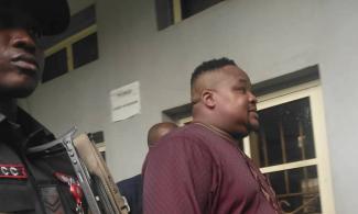 Naira Abuse: Socialite, Cubana Chief Priest Arrives Lagos Court For Arraignment 
